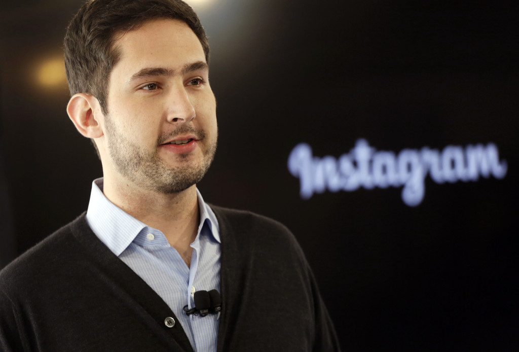 Instagram co-founder Kevin Systrom introduces a new feature, Instagram Direct, that lets users share photos and videos with up to 15 people rather than everyone who follows them on the popular photo-sharing app, at a news conference, Thursday, Dec. 12, 2013 in New York. (AP Photo/Mark Lennihan) / TT / kod 436